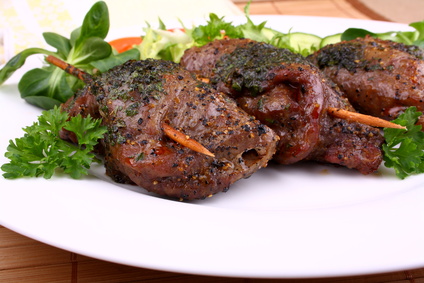 Juicy beef rolls with parsley and lettuce